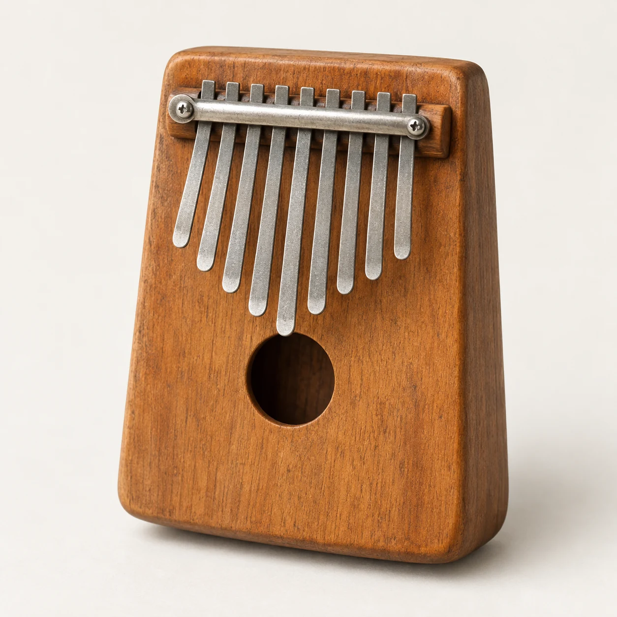 Instrumento de láminas metálicas. Imagen ilustrativa generada por IA; materiales: madera y acero.